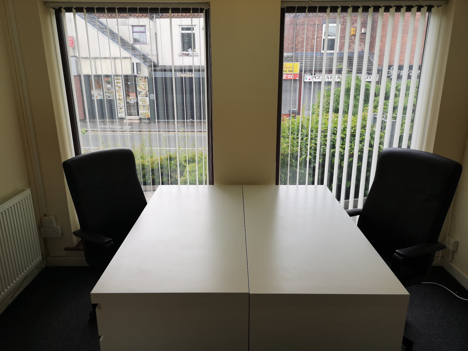 Serviced office interior with desks